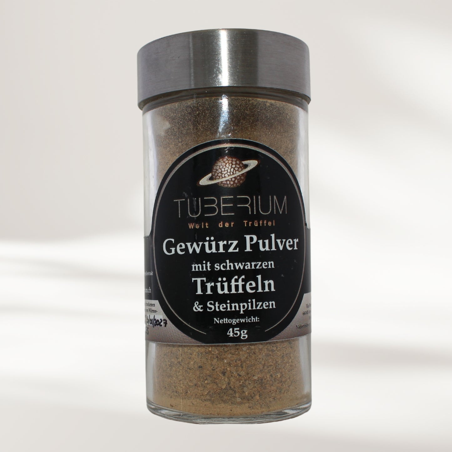 Gewürzpulver mit schwarzen Trüffeln und Steinpilzen